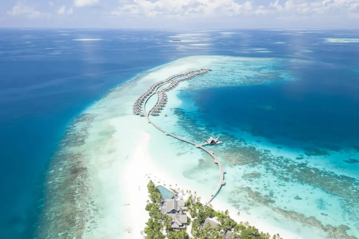 Aerial view of Joali island resort and its surrounding lagoon in the Maldives